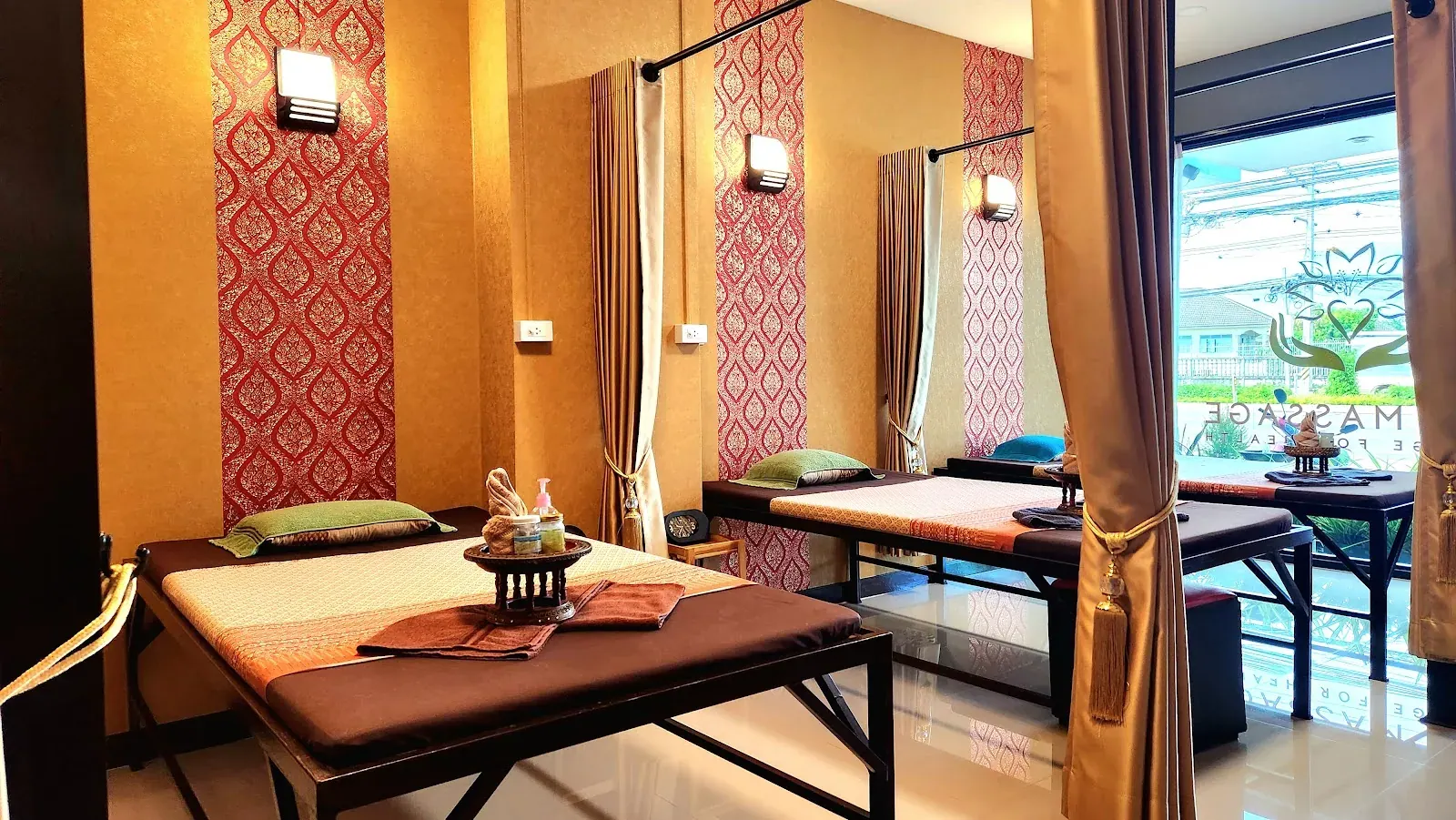 The real treatment room in warm gold and brown tones